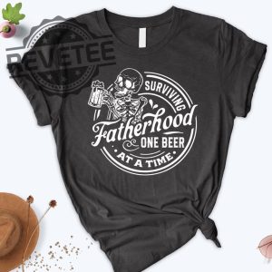 Surviving Fatherhood One Beer At A Time Shirt Fathers Day Gift revetee.com 5