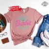 Pink Babe Doll Malibu Beach Shirt Pink Barbi Los Angeles Shirt I Am Enough Barbie Barbie Heimer Barbieheimer Shirt Barbie Oppenheimer Shirt Barbiheimer Barbie Heimer Barbenheimer Poster New revetee.com 4