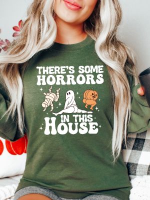 Funny Halloween Sweatshirt Theres Some Horrors In This House Sweatshirt Retro Halloween Sweater Funny Pumpkin Shirt Spooky Season Shirt Spirit Halloween Shirt Unique revetee.com 2