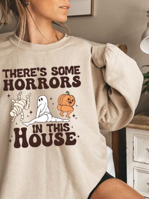 Theres Some Horrors In This House Sweatshirt Funny Halloween Sweatshirt Halloween Pumpkin Shirt Funny Halloween Shirt Spirit Halloween Shirt Halloween Sweaters Unique revetee.com 2