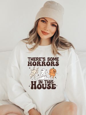 Theres Some Horrors In This House Sweatshirt Funny Halloween Sweatshirt Halloween Pumpkin Shirt Funny Halloween Shirt Spirit Halloween Shirt Halloween Sweaters Unique revetee.com 3