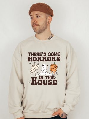 Theres Some Horrors In This House Sweatshirt Funny Halloween Sweatshirt Halloween Pumpkin Shirt Funny Halloween Shirt Spirit Halloween Shirt Halloween Sweaters Unique revetee.com 4