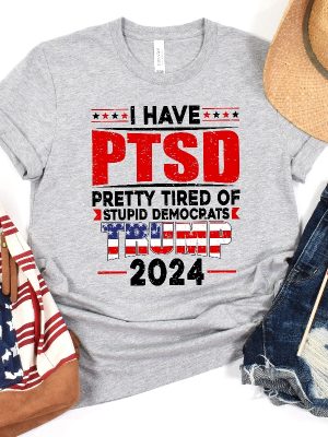 I Have Ptsd Pretty Tired Of Stupid Democrats Trump 2024 Shirt Trump Mug Shot Merchandise Trump Campaign Merch Trump Campaign Merchandise Donald Trump Mugshot Merchandise revetee.com 3