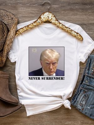 Never Surrender T Shirt Never Surrender Merchandise Trump Mugshot Merchandise Trump Mug Shot Merchandise Donald Trump Merchandise Trump T Shirts Donald Trump Mugshot Shirt revetee.com 4