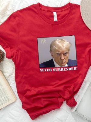 Never Surrender T Shirt Never Surrender Merchandise Trump Mugshot Merchandise Trump Mug Shot Merchandise Donald Trump Merchandise Trump T Shirts Donald Trump Mugshot Shirt revetee.com 5