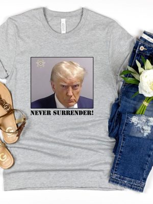 Never Surrender T Shirt Never Surrender Merchandise Trump Mugshot Merchandise Trump Mug Shot Merchandise Donald Trump Merchandise Trump T Shirts Donald Trump Mugshot Shirt revetee.com 6