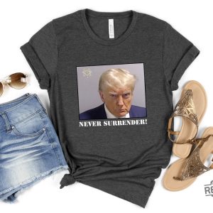 Never Surrender T Shirt Never Surrender Merchandise Trump Mugshot Merchandise Trump Mug Shot Merchandise Donald Trump Merchandise Trump T Shirts Donald Trump Mugshot Shirt revetee.com 7