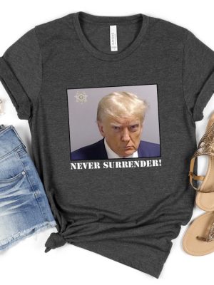 Never Surrender T Shirt Never Surrender Merchandise Trump Mugshot Merchandise Trump Mug Shot Merchandise Donald Trump Merchandise Trump T Shirts Donald Trump Mugshot Shirt revetee.com 7