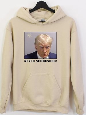 Trump Never Surrender Hoodie Never Surrender T Shirt Never Surrender Merchandise Trump Mugshot Merchandise Trump Mug Shot Merchandise Donald Trump Merchandise Unique revetee.com 3