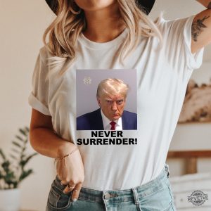 Trump Never Surrender Merchandise Trump Mugshot Merchandise Trump Mug Shot Merchandise Donald Trump Merchandise Trump T Shirts Donald Trump Mugshot Shirt Unique revetee.com 2