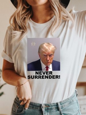 Trump Never Surrender Merchandise Trump Mugshot Merchandise Trump Mug Shot Merchandise Donald Trump Merchandise Trump T Shirts Donald Trump Mugshot Shirt Unique revetee.com 2