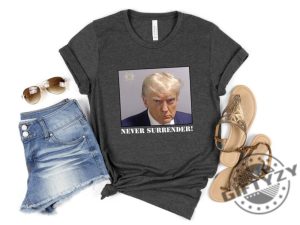 Trump Never Surrender Shirt Donald Trump Tshirt Free Trump Hoodie Sweatshirt Donald Trump Mugshot Never Surrender Trump Shirt giftyzy.com 7