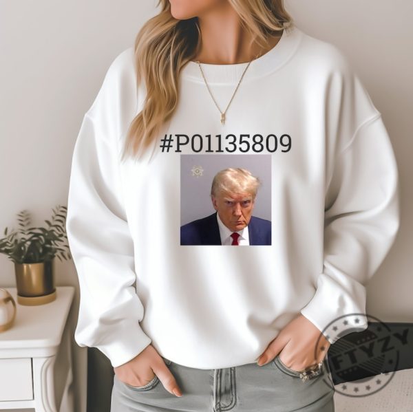 Trump Mugshot Shirt Donald Trump Mugshot Tshirt Sweater Hoodie Arrested Fulton Donald Trump Mugshot Sweater Mjga giftyzy.com 1