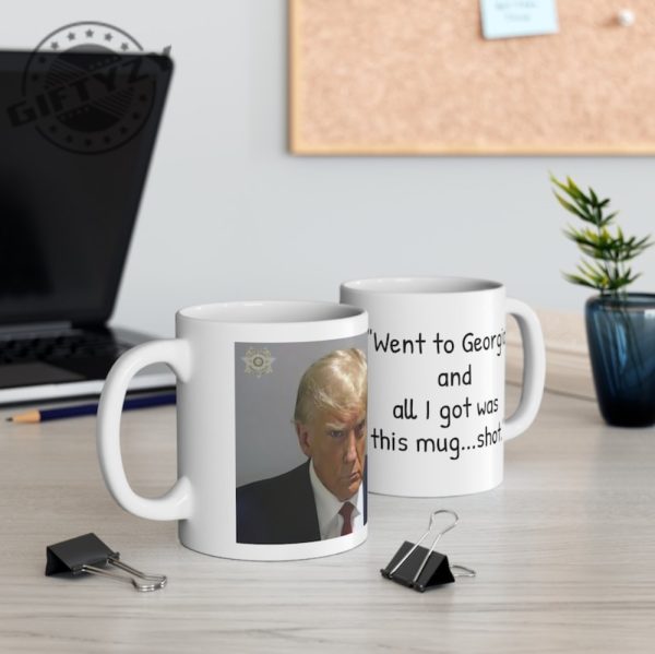 Trump Mugshot Went To Georgia And All I Got Was This Mug Shot Ceramic Mug Actual Trump Prison Mug Shot Trump Never Surrender Mug giftyzy.com 2