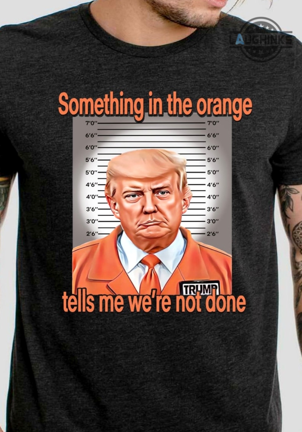 trump mug tshirt something in the orange shirt donald trump mug shot sweatshirt trump mugshot tshirt trump mug shot merch donald trump jail hoodie laughinks.com 1