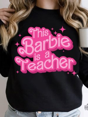 This Barbie Is A Teacher Shirt Teacher Appreciation Shirt Cute Shirt For Teacher Teacher Life Shirt Teacher T Shirt Ideas Good Teacher Life Goodteacherlife Oppenheimer Barbie Movie 2023 revetee.com 2