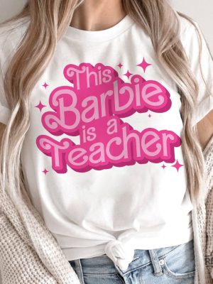 This Barbie Is A Teacher Shirt Teacher Appreciation Shirt Cute Shirt For Teacher Teacher Life Shirt Teacher T Shirt Ideas Good Teacher Life Goodteacherlife Oppenheimer Barbie Movie 2023 revetee.com 3