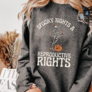 spooky nights and reproductive rights tshirt sweatshirt hoodie abortion roe v wade overturned shirts dancing skeleton and pumpkin social justice feminism 1973 laughinks 3 1