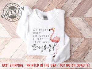 Wrinkles Only Go Where Smiles Have Been Sweatshirt Flamingo Hoodie Jimmy Buffett Tshirt Memorial Shirt giftyzy.com 2