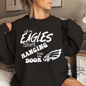 eagles t shirt hanging from the door｜TikTok Search