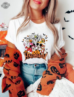 Retro Disneyland Halloween Sweatshirt Mickey And Friends Trick Or Treats 2023 Mickey Halloween Special Mickey And Minnie Wish Upon A Christmas Mickey Pumpkin Unique revetee 2