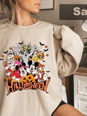 Retro Disneyland Halloween Sweatshirt Mickey And Friends Trick Or Treats 2023 Mickey Halloween Special Mickey And Minnie Wish Upon A Christmas Mickey Pumpkin Unique revetee 3