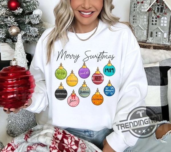 Merry Swiftmas Sweatshirt Cute Famous Christmas Ball Sweatshirt Eras Tour Merch Merry Swiftmas Hoodie Taylor Swift Movie Tour Eras trendingnowe.com 1