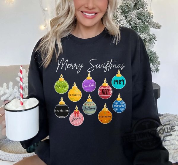 Merry Swiftmas Sweatshirt Cute Famous Christmas Ball Sweatshirt Eras Tour Merch Merry Swiftmas Hoodie Taylor Swift Movie Tour Eras trendingnowe.com 3