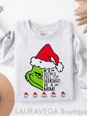 Personalized In A World Full Of Grandmas Be A Mimi Grinch Sweatshirt Be A Mimi Grinch Custom Sweatshirt Family Shirt Grinch Grandma Shirt revetee 2