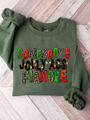 Somebodys Jolly Ass Fiancee Merry Christmas Women Sweatshirt Fiancee Sweater For Christmas Christmas Shirt Holiday Winter Sweatshirt Unique revetee 3