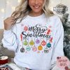 merry swiftmas sweatshirt tshirt hoodie mens womens the eras tour christmas shirts 1989 xmas have a merry swiftmas tee taylors version gift for swifties laughinks 1