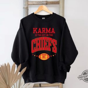 Karma Is The Guy On The Chiefs Sweatshirt Travis Kelce Kansas City Swifties Merch Eras Tour T Shirt trendingnowe.com 2