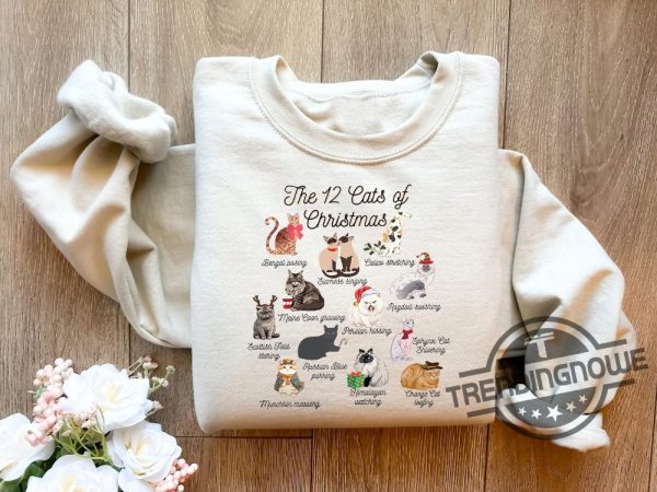 The 12 Cats Of Christmas Sweatshirt Cute Christmas Cats Shirt Christmas Cat Mom Shirt Cat Lover Christmas Sweater trendingnowe.com 1