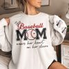 This Baseball Mom Wear Her Heart On Her Sleeve Personalized Sweatshirt Unique Baseball Mom Tees Hoodie T Shirt revetee 1