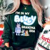 In My Blue Granny Era Shirt Retro Blue And Bingo Here Come The Grannies T Shirt Blue Heeler Family Matching Shirt Bluey Mothers Day Gift revetee 1