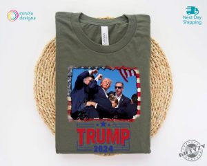 Trump Shooting Shirt Donald Trump President 2024 Unstoppable Hoodie President Trump 47 Shot At Rally Fist In The Air Sweatshirt Take America Back Tshirt Trump Shirt giftyzy 7