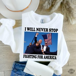 Trump Shirt I Will Never Stop Fighting For America Trump Shooting Rally Shirt Trump Assassination Attempt Shirt revetee 1