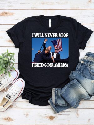 Trump Shirt I Will Never Stop Fighting For America Trump Shooting Rally Shirt Trump Assassination Attempt Shirt revetee 4