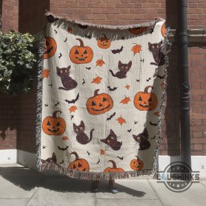 halloween pumpkin and spooky black cat woven blanket