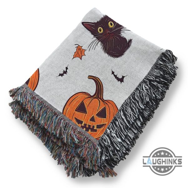 halloween pumpkin and spooky black cat woven blanket