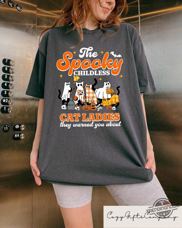 The Spooky Childless Cat Lady For Kamala Shirt Retro Cat Ghost Tshirt Kamala Halloween T Shirt Feminist Halloween Tshirt trendingnowe 2