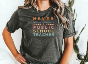 Never Underestimate A Public School Teacher Shirt Harris Walz 2024 Rally Merch Tim Walz Dnc Quote Tshirt Educator Sweatshirt Teacher Gift giftyzy 2