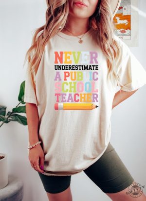 Never Underestimate A Public School Teacher Kamala Harris Tshirt Harris Walz 2024 Rally Merch Tim Walz Dnc Quote Sweatshirt Educator Tshirt giftyzy 2