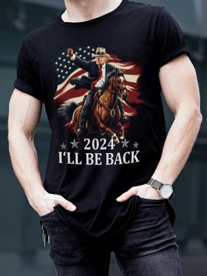 Donald Trump 2024 Shirt Trump Riding A Horse With The American Flag Cowboy Trump Tshirt revetee 2