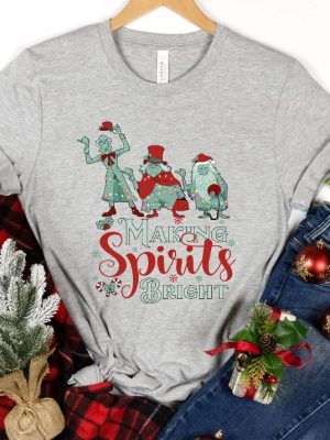 Making Spirits Bright Hitchhiking Ghosts Santa Hat Merry Christmas Haunted Mansion Shirt Disney Christmas Shirt Hoodie Sweatshirt revetee 5