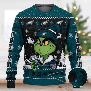 the grinch holding philadelphia eagles coffee ugly christmas sweater