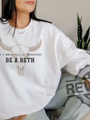 Boho Cow Skull In A World Full Of Princesses Be A Beth Sweatshirt Hoodie T Shirt Tee Gifts Howdy Wild West Cowgirl Shirt Bull Skull Country Music Shirt revetee 4