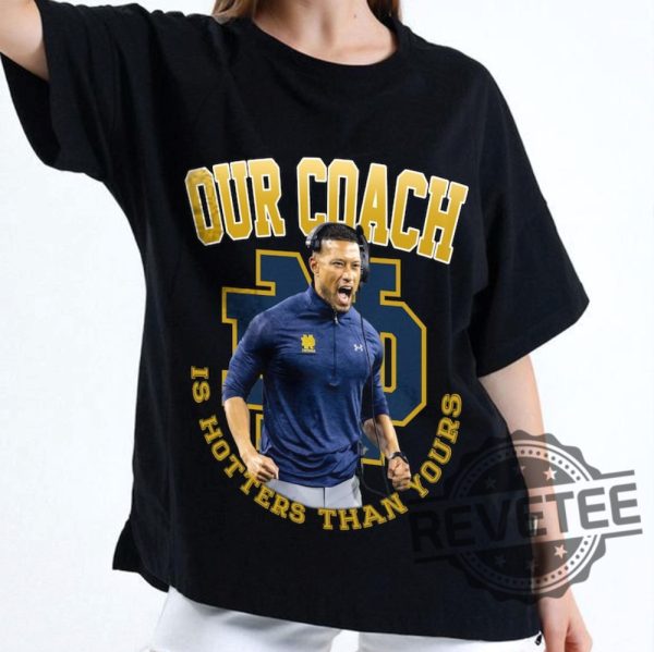 Notre Dame Fighting Irish Our Coach Is Hotter Than Yours Marcus Freeman Tshirt Hoodie Sweatshirt Tee Gift For Man Women Crewneck Unique revetee 1 1