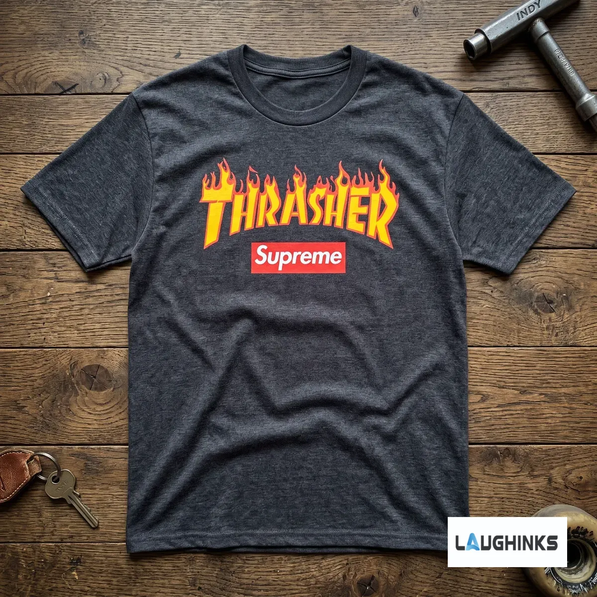 Thrasher x Supreme Flame Logo Graphic T-shirt 2026 6 Detailed front view of the black Thrasher x Supreme collaboration flame logo t-shirt on a leather background. (Detail view #4)