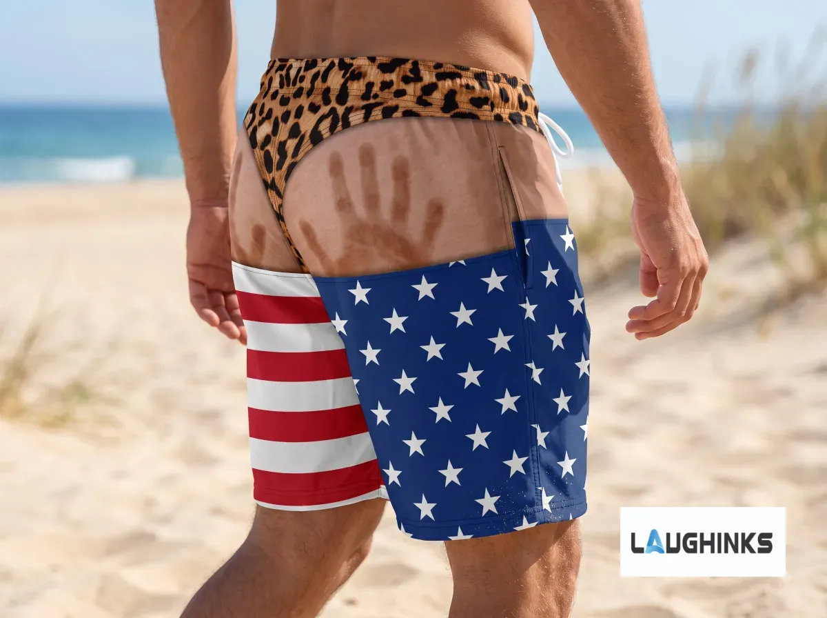 American Flag Leopard Print Funny Handprint Swim Trunks AOP Hawaiian Shorts for Men 5 Front view of American flag and leopard print swim trunks with white drawstring, worn by a man at the beach. (Detail view #3)